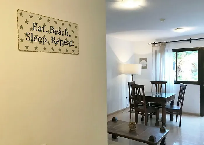 Tropical Garden Retreat: Private Terrace & Pool Oasis Apartment Corralejo